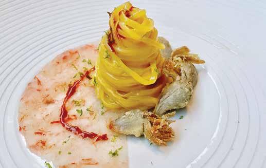 Domači špageti v slastni omaki s carpacciom iz škampov, ki je bil postavljen okrog testenin, nagrade za jedce pa so bila srca