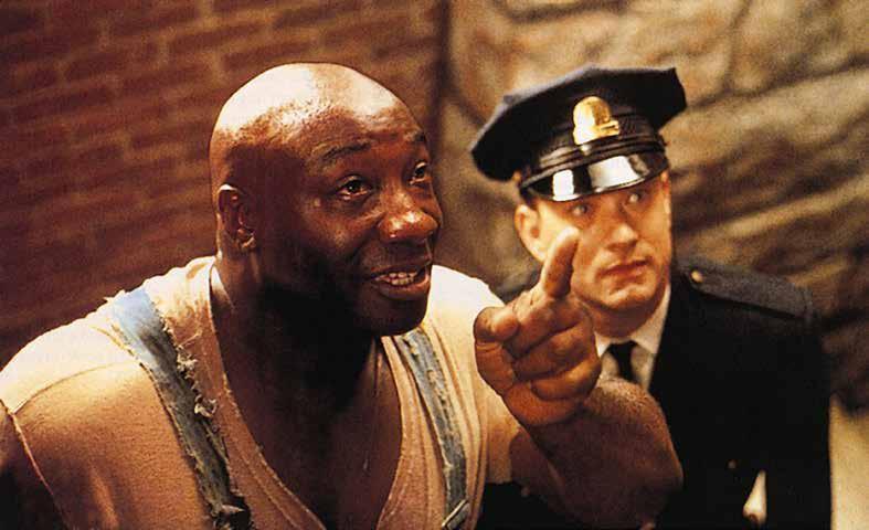 green Mile (Zelena Milja) - Na smrt obsojeni in nedolžni temnopolti velikan (miChAel ClARKe ddunCAn), ki je obdarjen stelepatskimi zdravilnimi močmi in jetniški paznik Tom hAnKS.